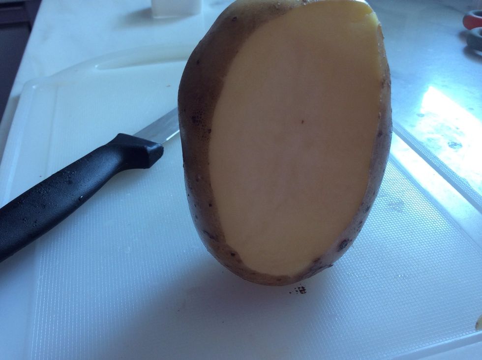 Slice a thin piece off to get to the flesh.