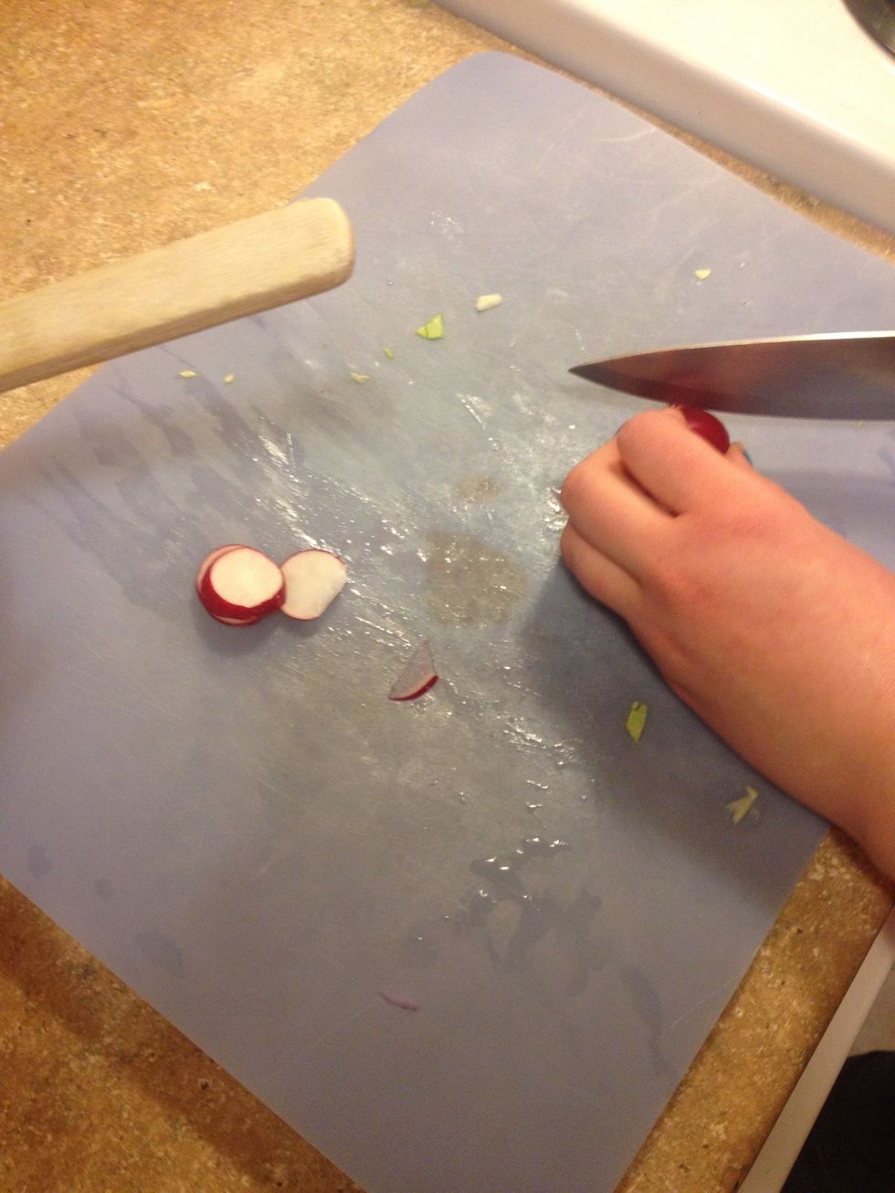 Slice about 8-10 small radishes add to cabbage