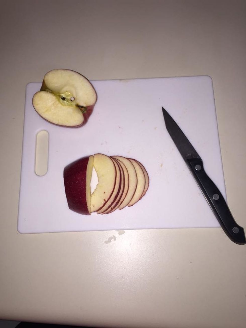 Slice an apple into thin slices.