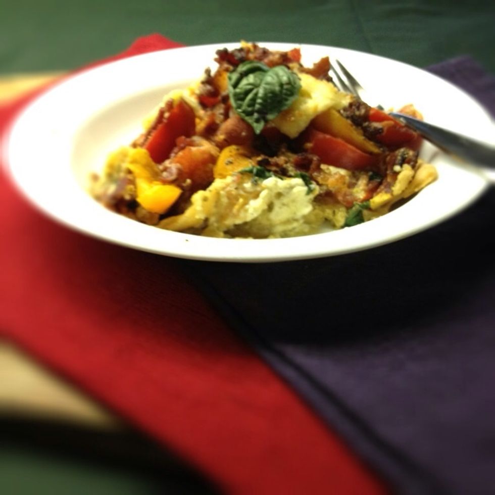 Slice and serve...lifting out with a spatula. With the firmer Roma tomatoes and the right pan the slices will hold together better looking more like a tart. But this was just as tasty!