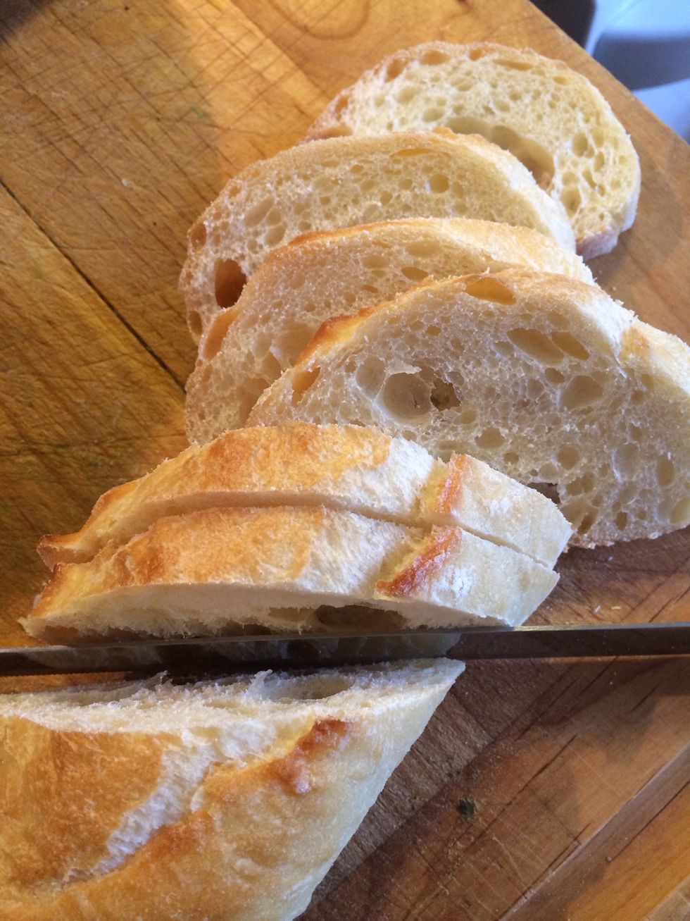 Slice bread, and toast your crostinis in the oven for 5 minutes.