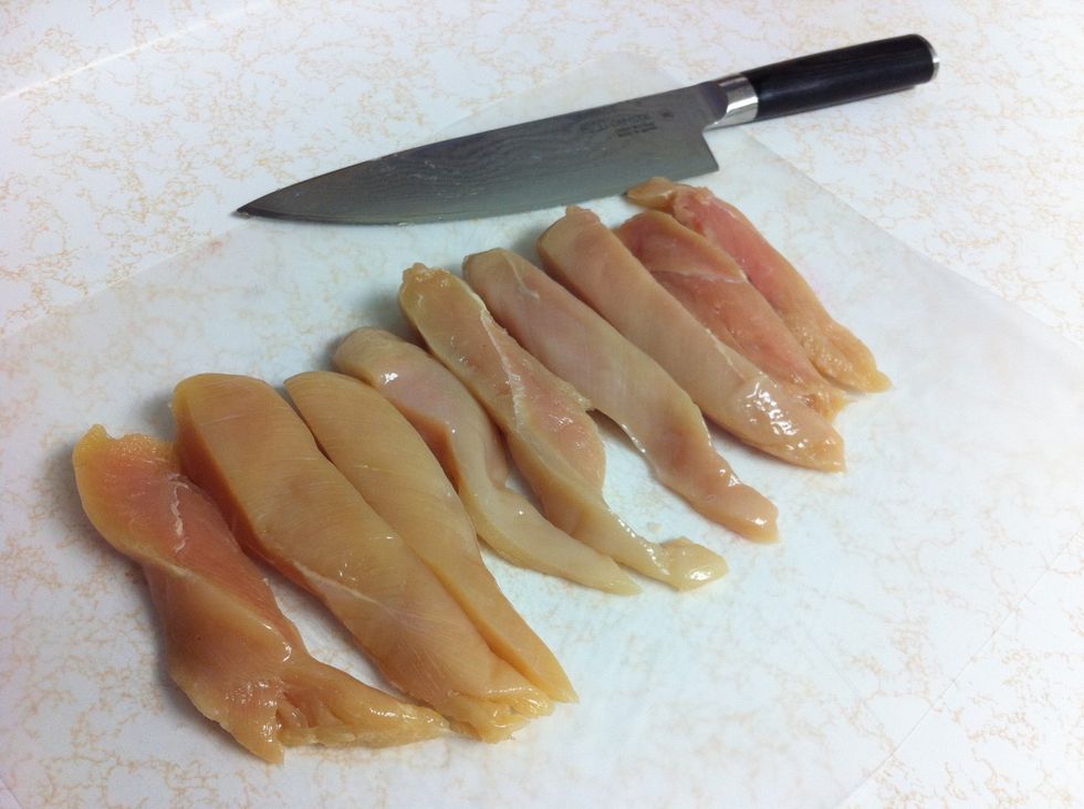 Slice chicken breasts into strips - the pack that I purchased came with three chicken breasts. I cut three strips per chicken breast.
