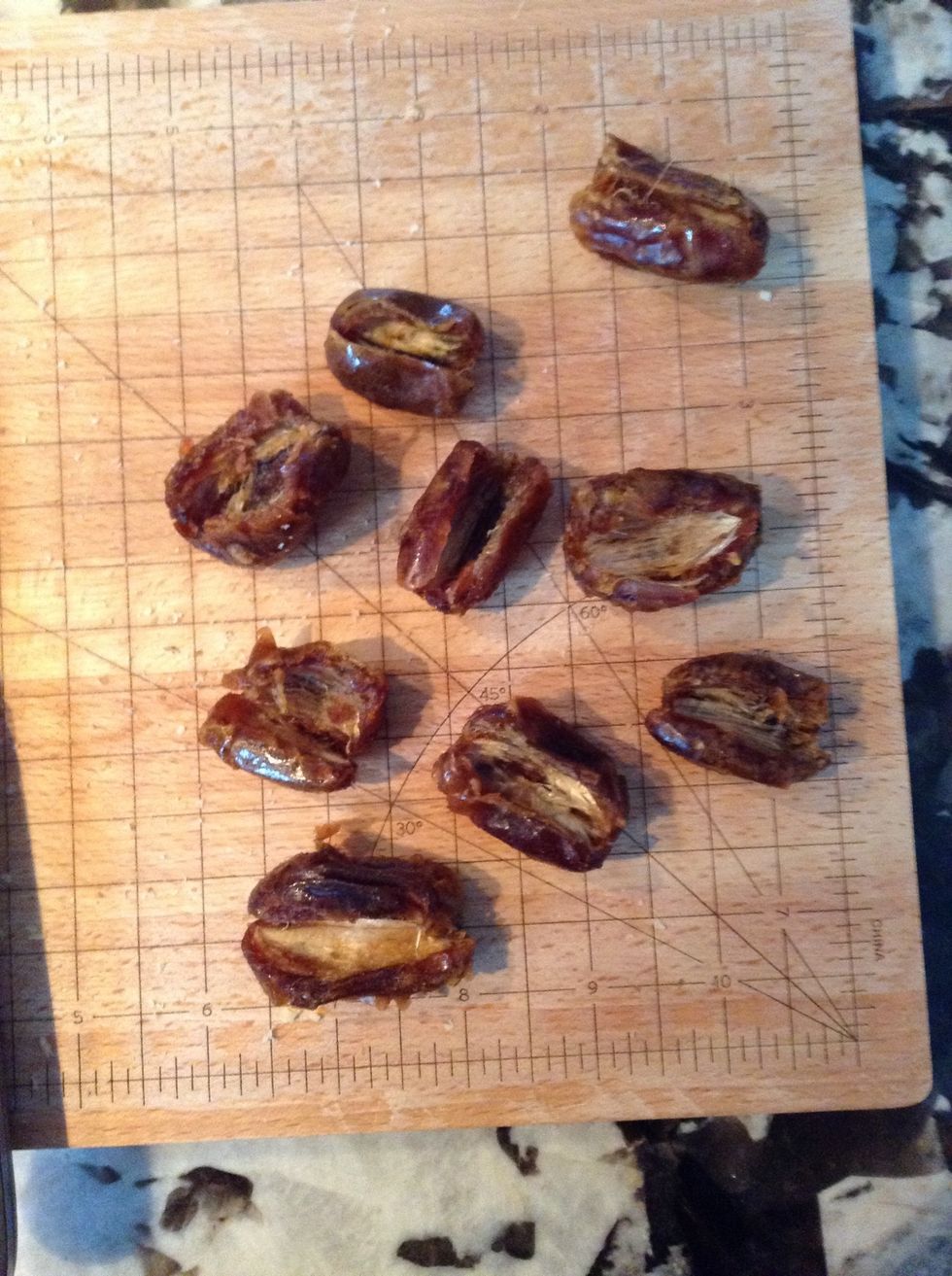 Slice dates open to reveal the inside. Be careful not to cut them in half!