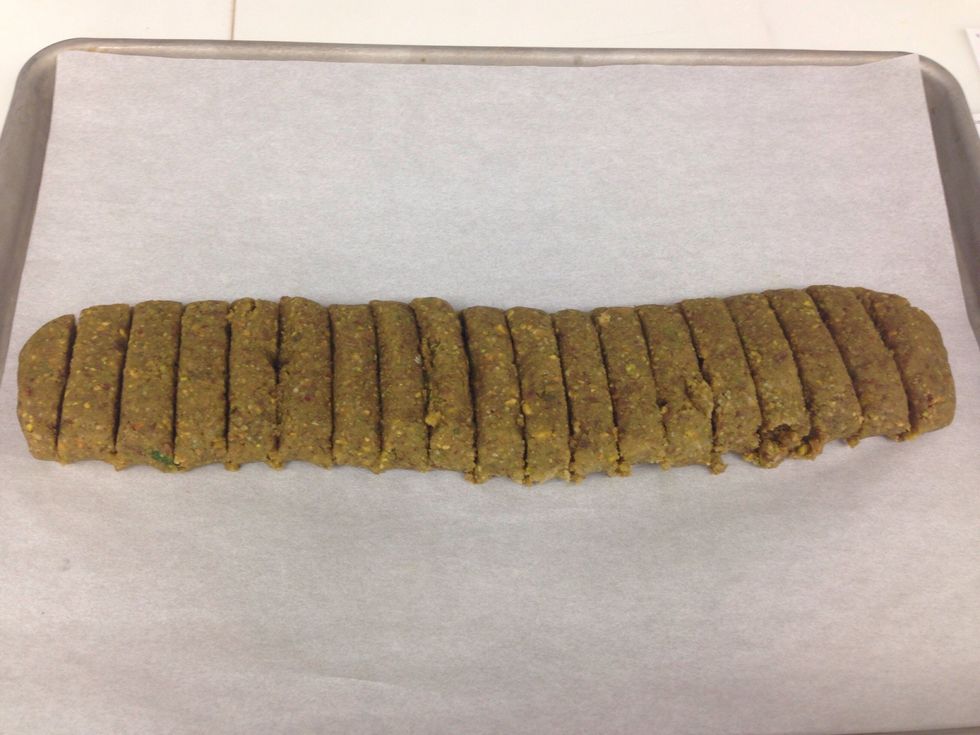 Slice dough into 3/4 inch cookies.