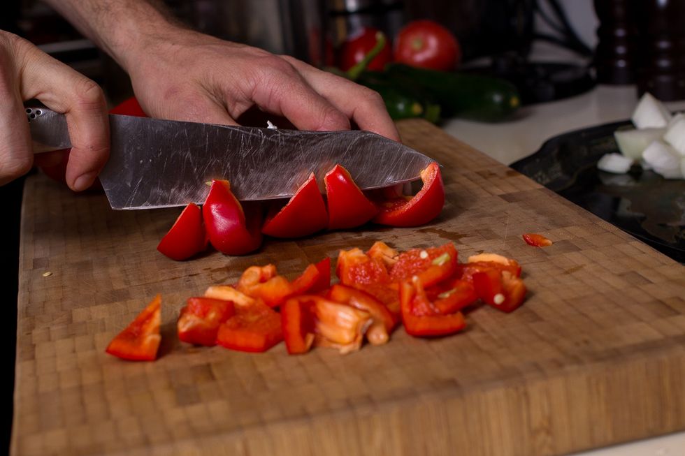 Slice each half into 1/2 inch wedges, then line them up and cut the the curved top off.