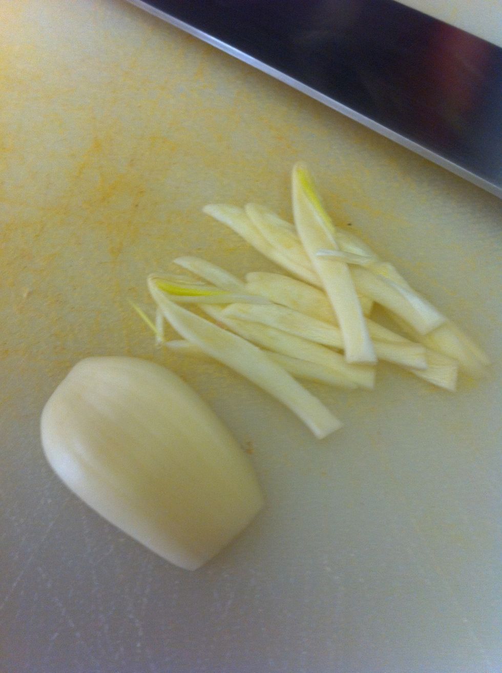 Slice garlic lengthwise into little thin strips