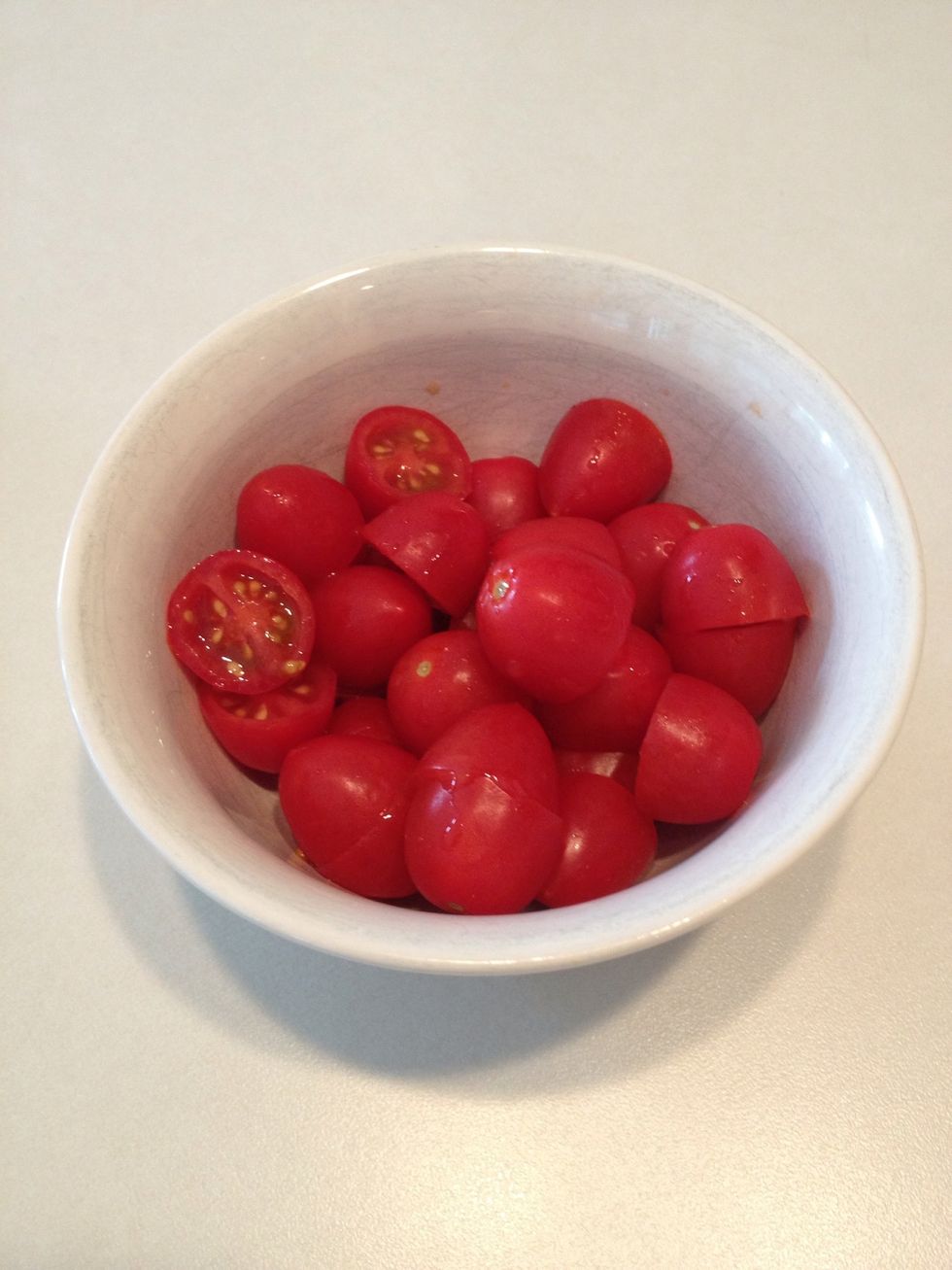 Slice grape tomatoes.  Set aside for later.