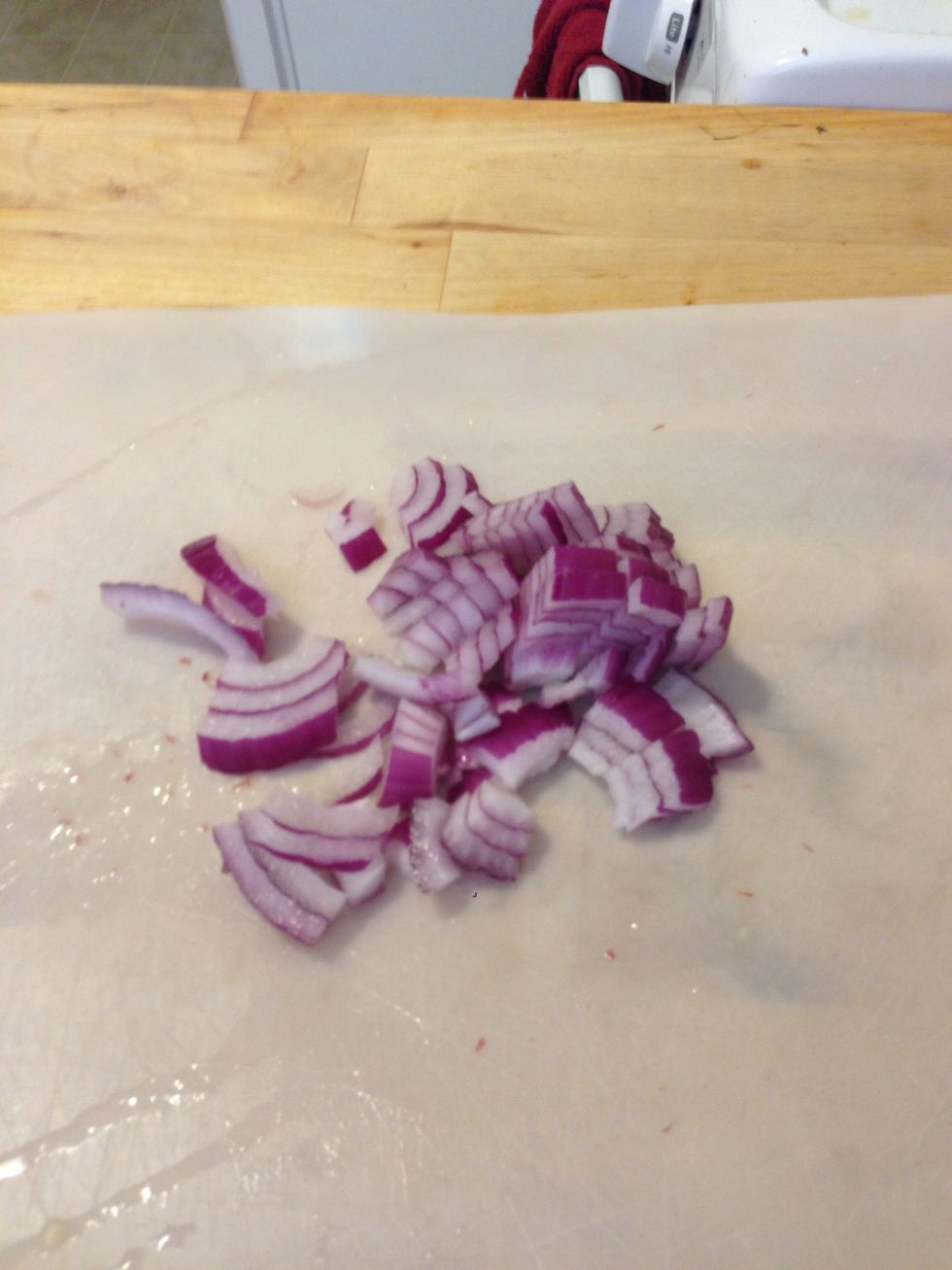 Slice half an onion and add it to the mixture.