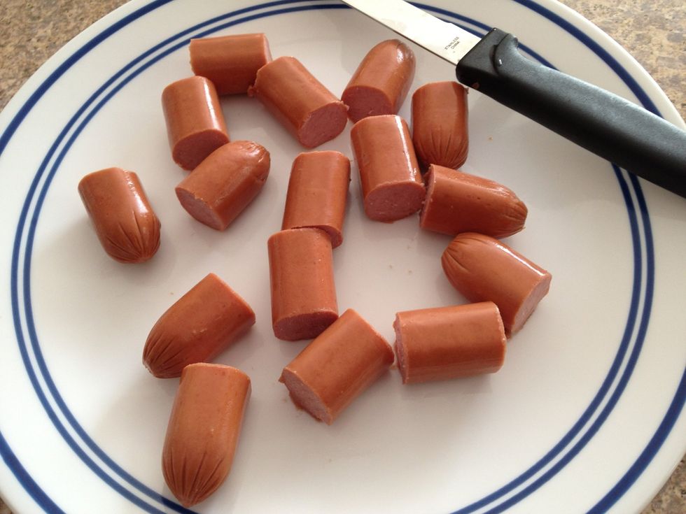 Slice hot dogs into 1 inch segments