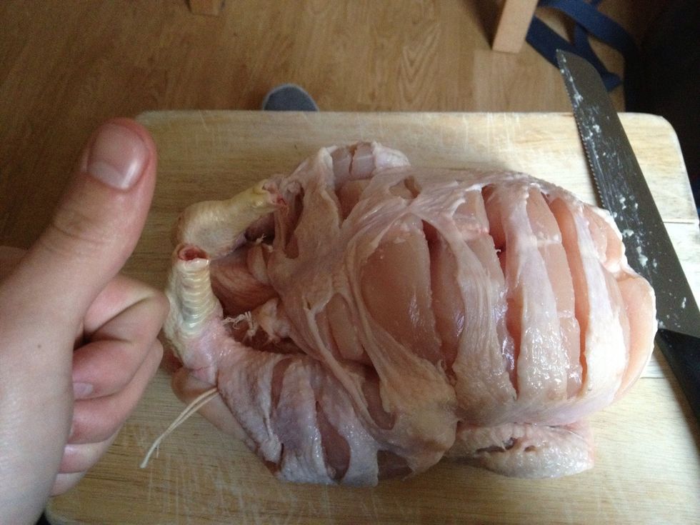 Slice it as if you were cutting slices of bread... Obviously without going all the way through. I find a bread knife is best for this. It will make your chicken a bit floppy.... Stick it in a pan now.