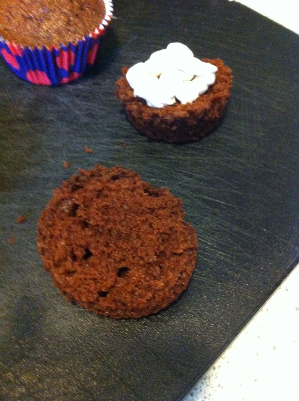 Slice it over and pour the cream ind The muffins