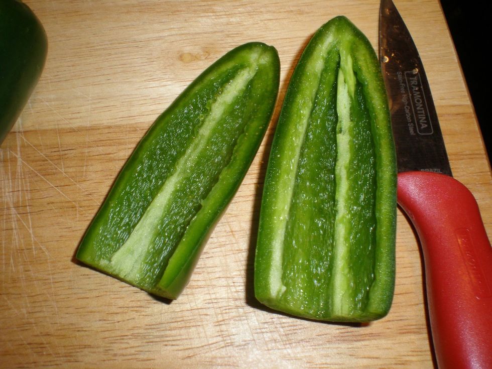 Slice Jalapeno in half and gut out the insides then cut into one inch pieces.