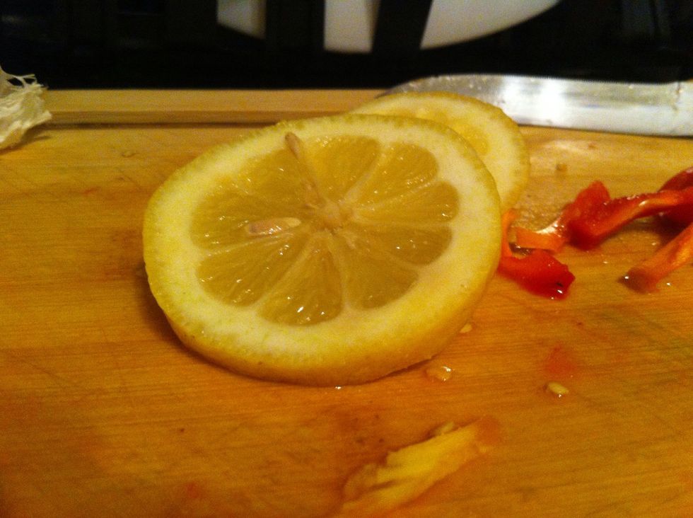 Slice lemon into rings