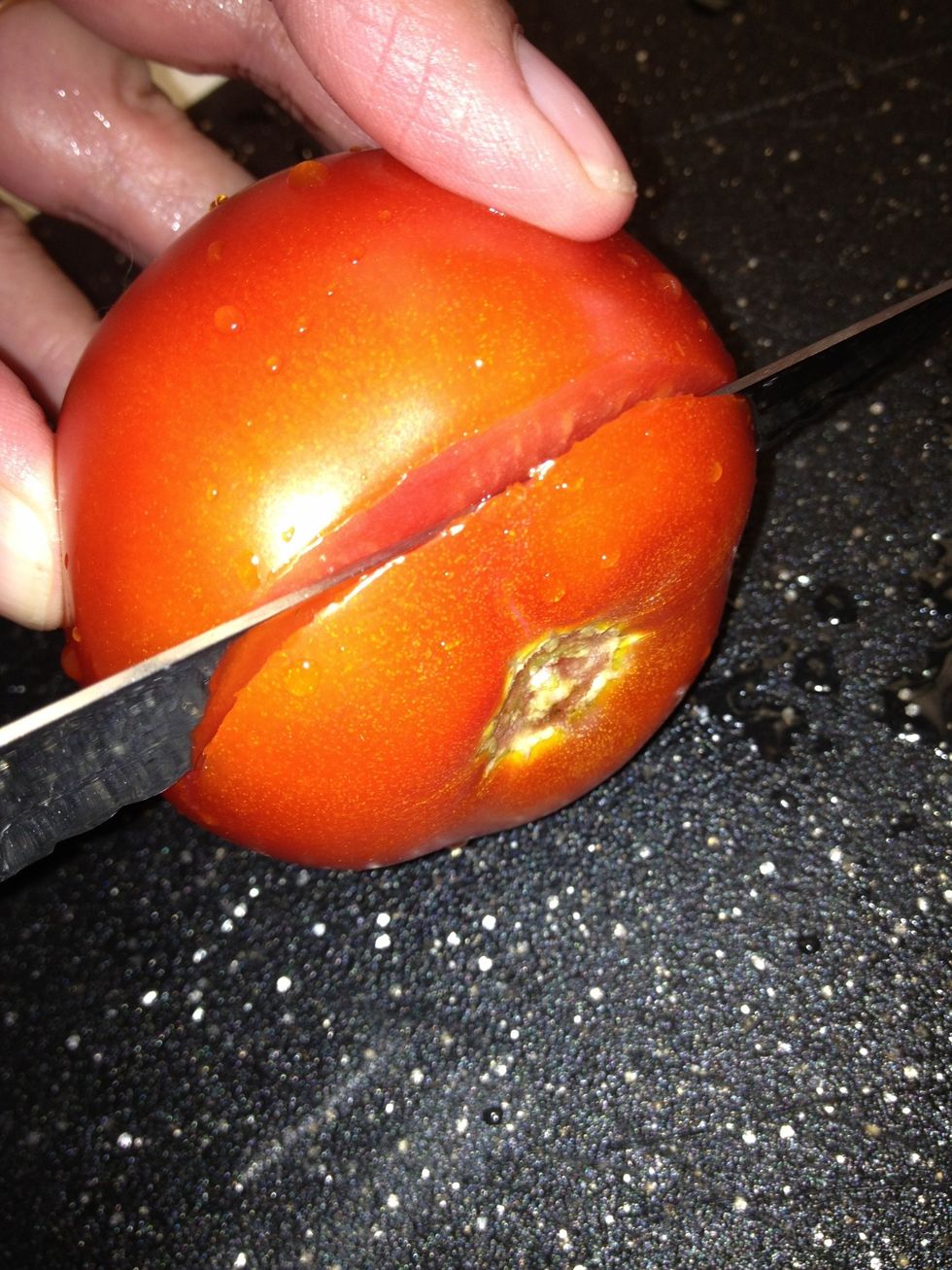 Slice off the core and throw away.