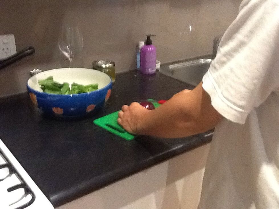 Slice onion into thirds and then place with lemon grass and chilli
