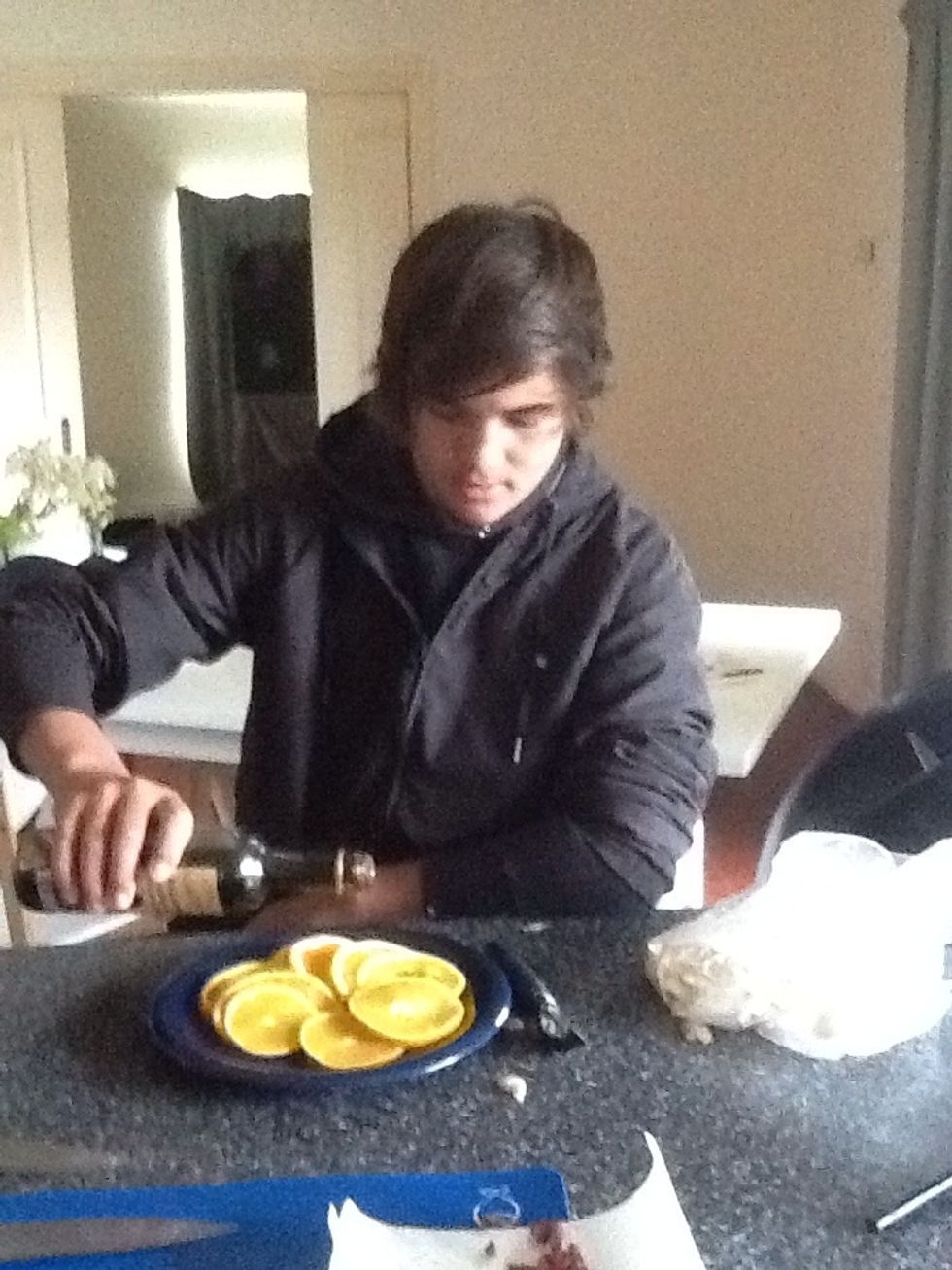 Slice oranges finely and smother in Balsamic Vinegar