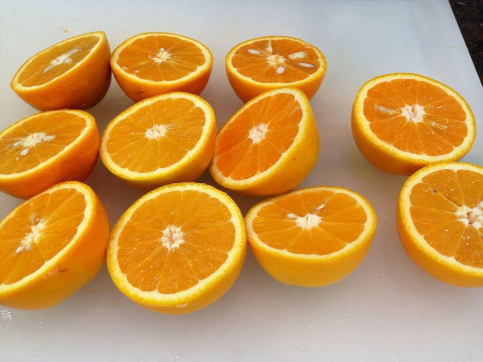 Slice oranges in half. What a beautiful color!