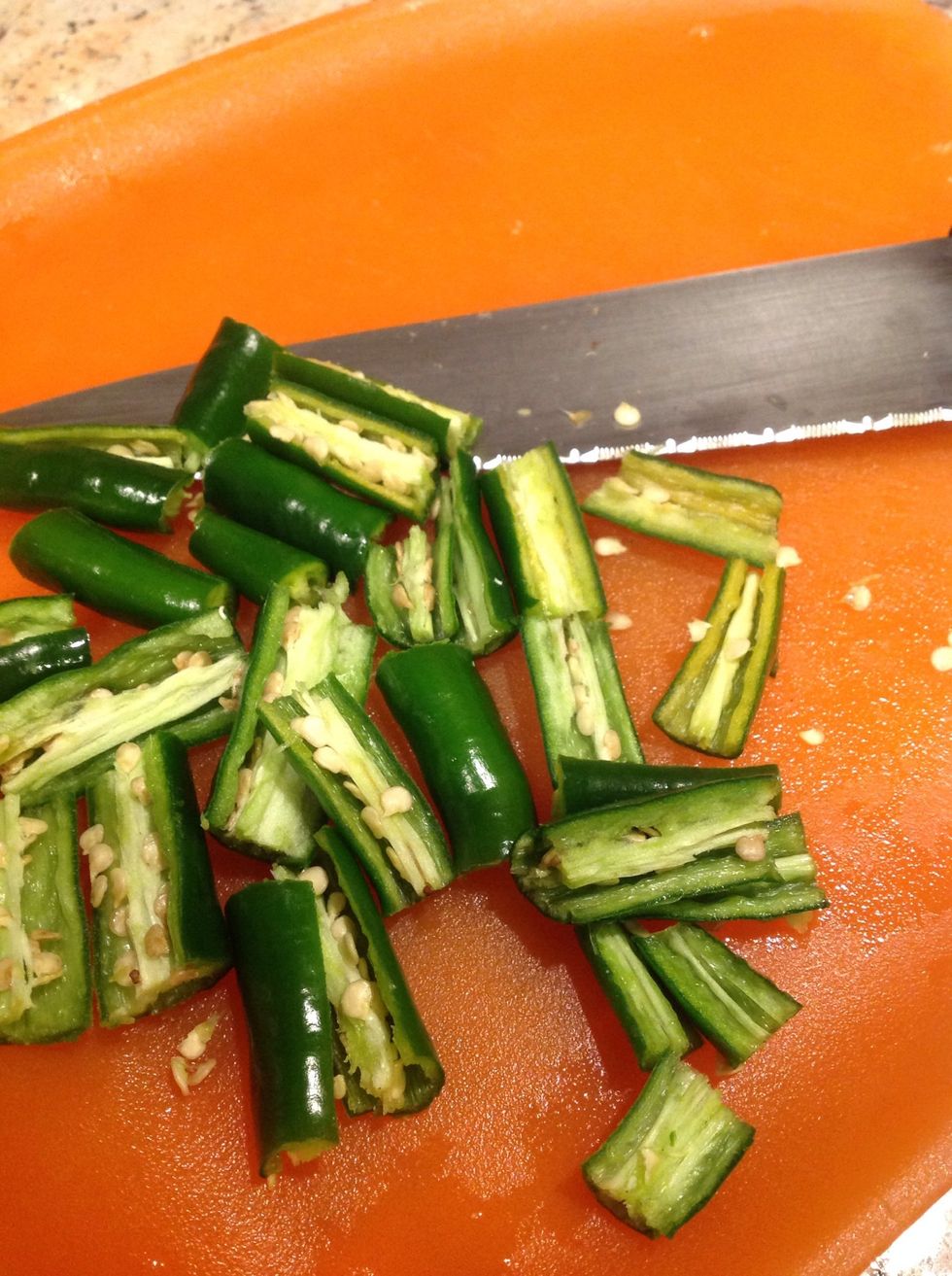 Slice some green chillies.