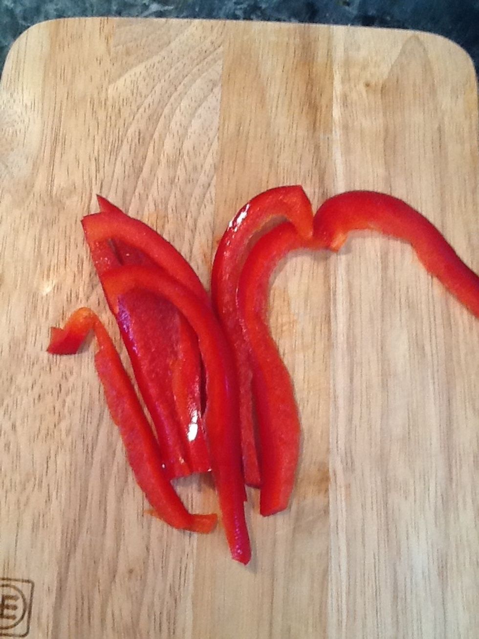 Slice some pieces of red peppers.