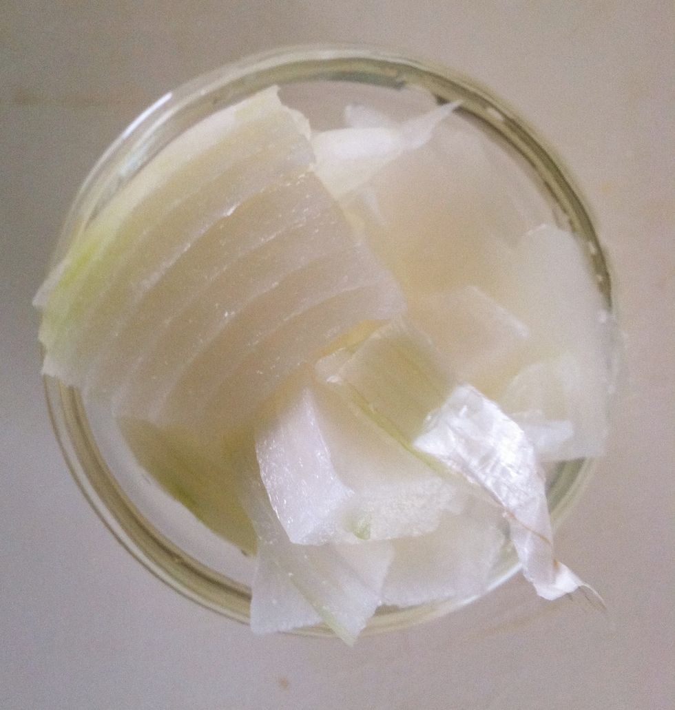 Slice some white onions.