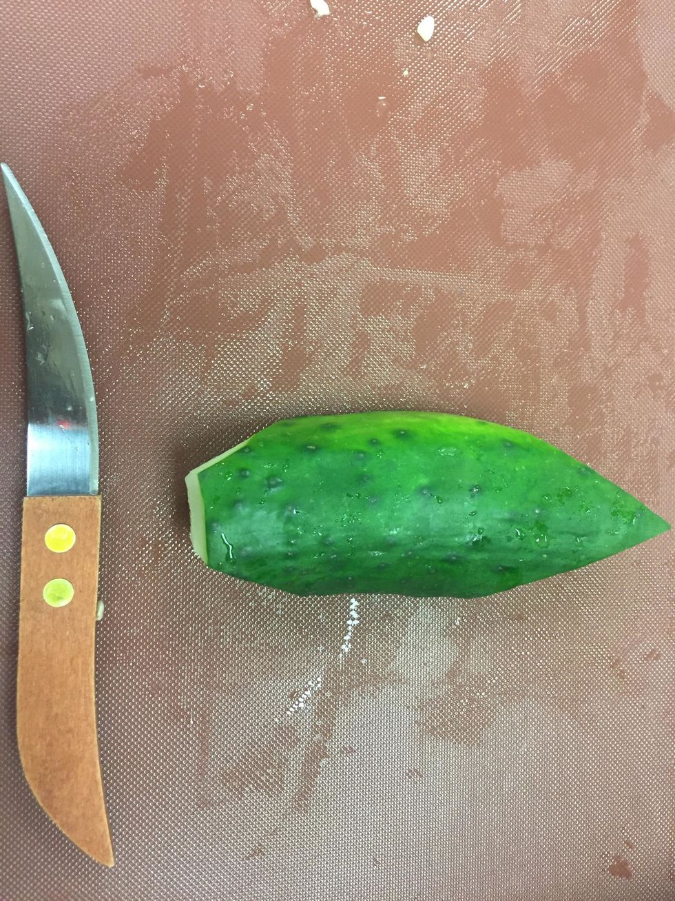 Slice strips off each side of the cucumber slightly and round your cuts.