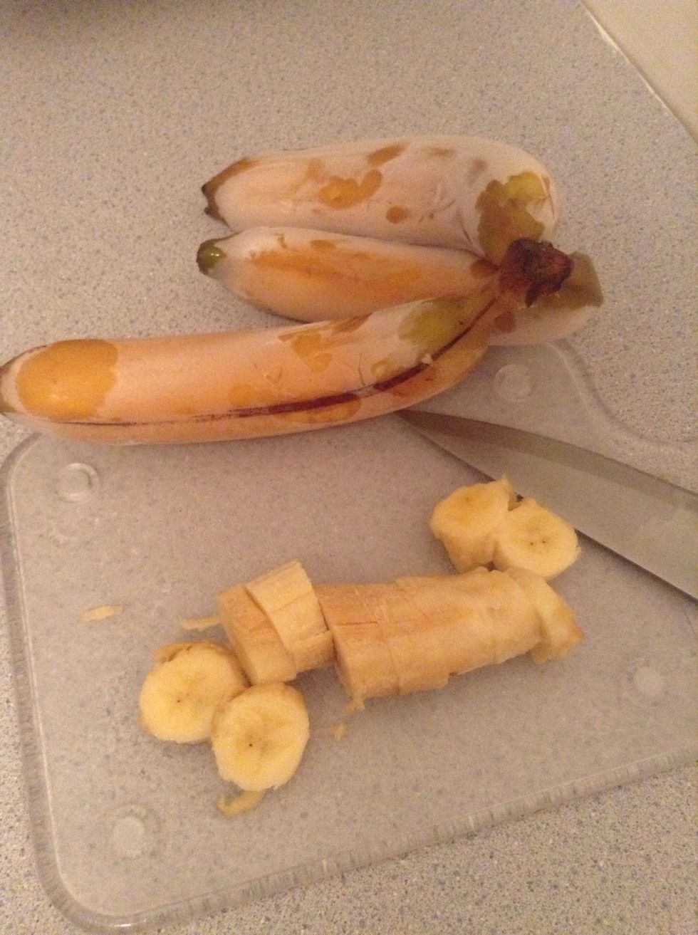 Slice the bananas up and immediately put them into the blender or food processor... Do not thaw them out or they will get mushy and gross