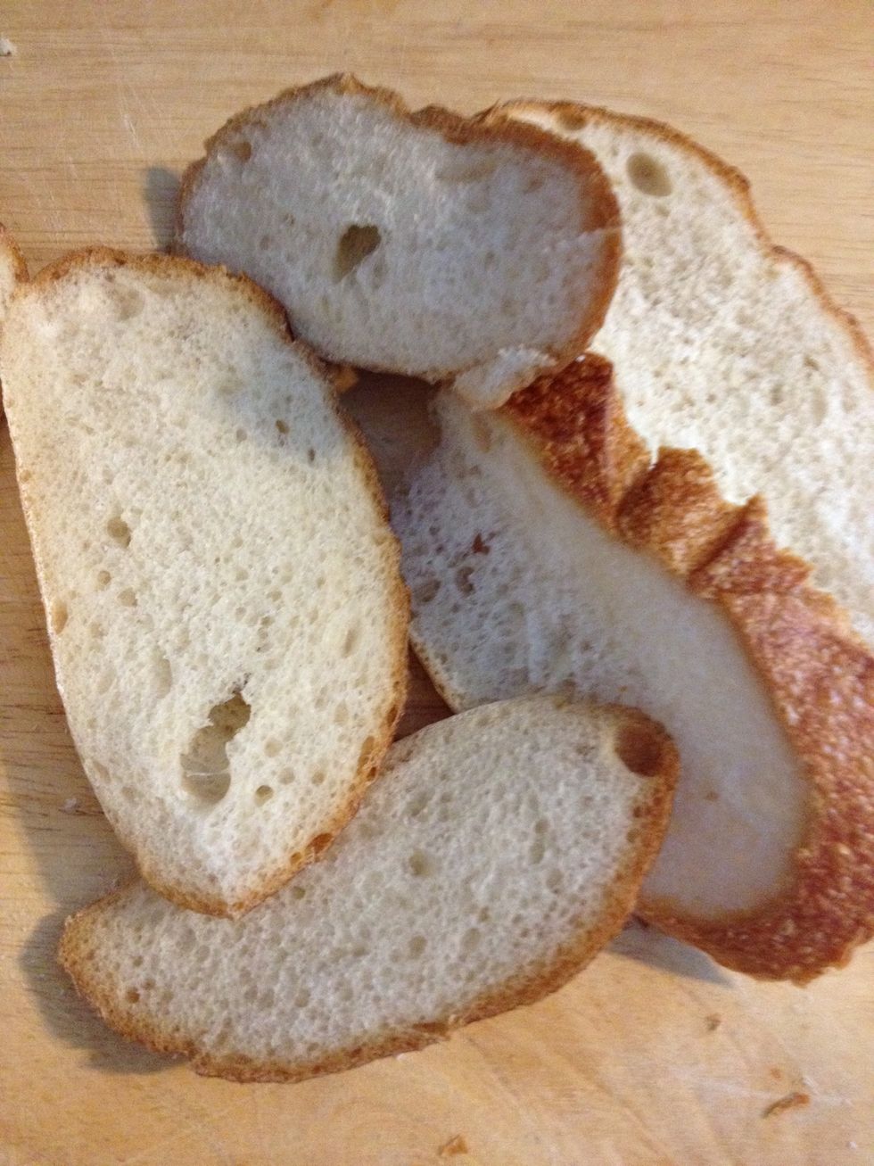 Slice the bread if it isn't already sliced. The best breads to use for this are Italian, French, sourdough, or baguette. Put the bread on a cookie sheet or oven pan.