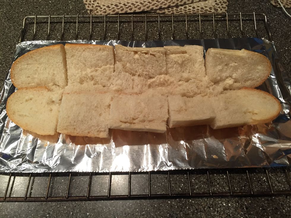 Slice the bread in half longways then slice it across the other way into however many slices you want.