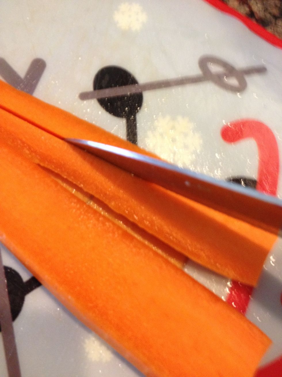 Slice the carrots also into long, thing strips.