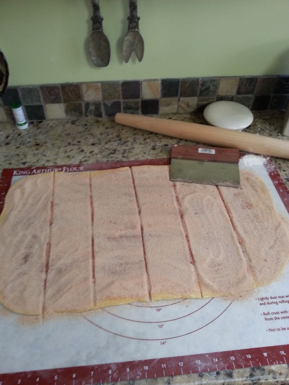 Slice the dough vertically, into six equal-sized strips