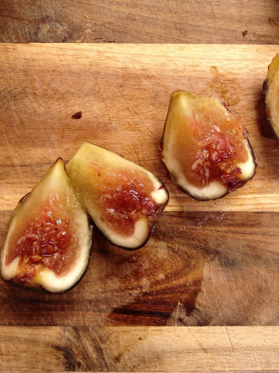 Slice the fresh fig in pieces. Snack a little bit.