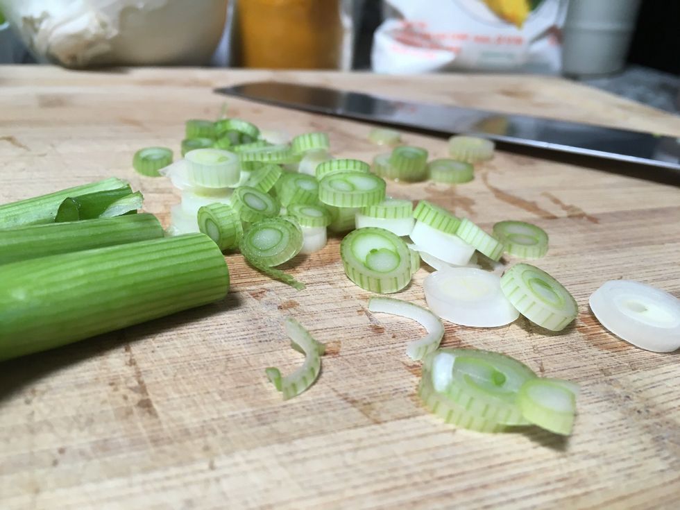 Slice the green onions.