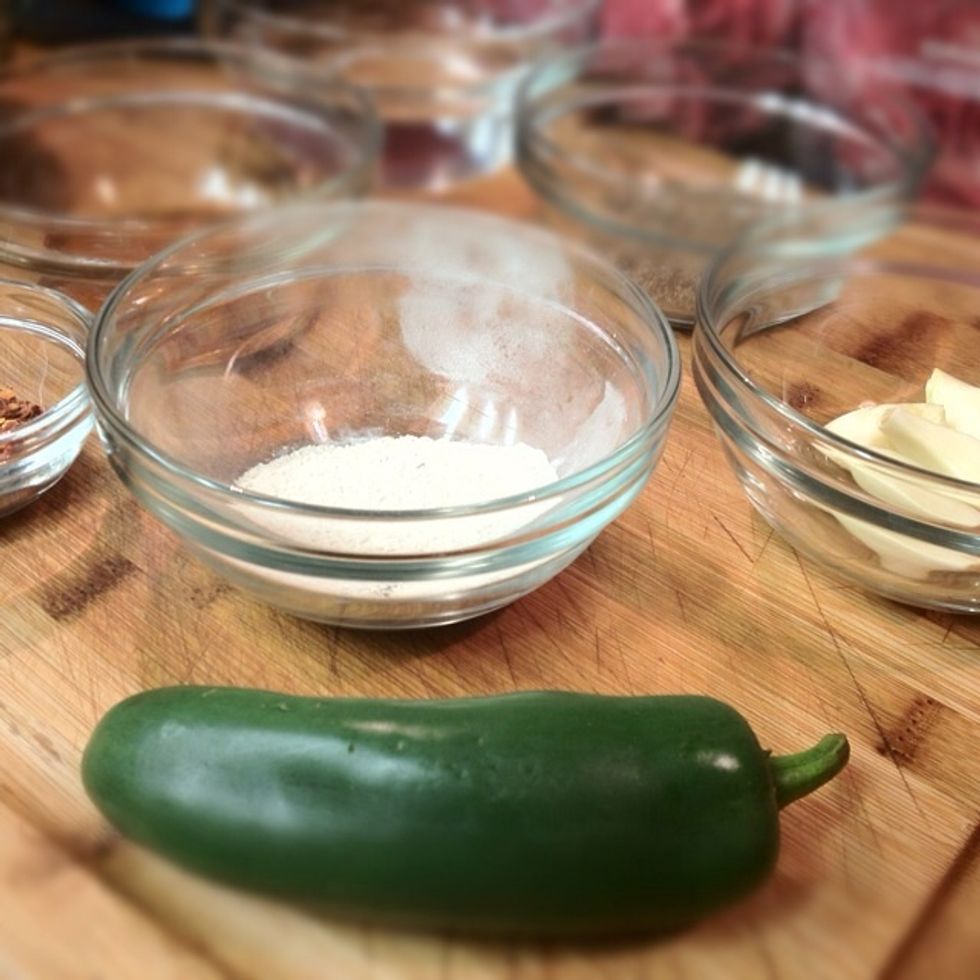 Slice the jalape\u00f1o to release the juice! (Won't be consumed so slicing method can be rough!)