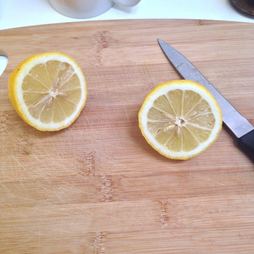Slice the lemon in half. You could also replace the laborious lemon-squeezing with lemon juice (about 1/2 cup).