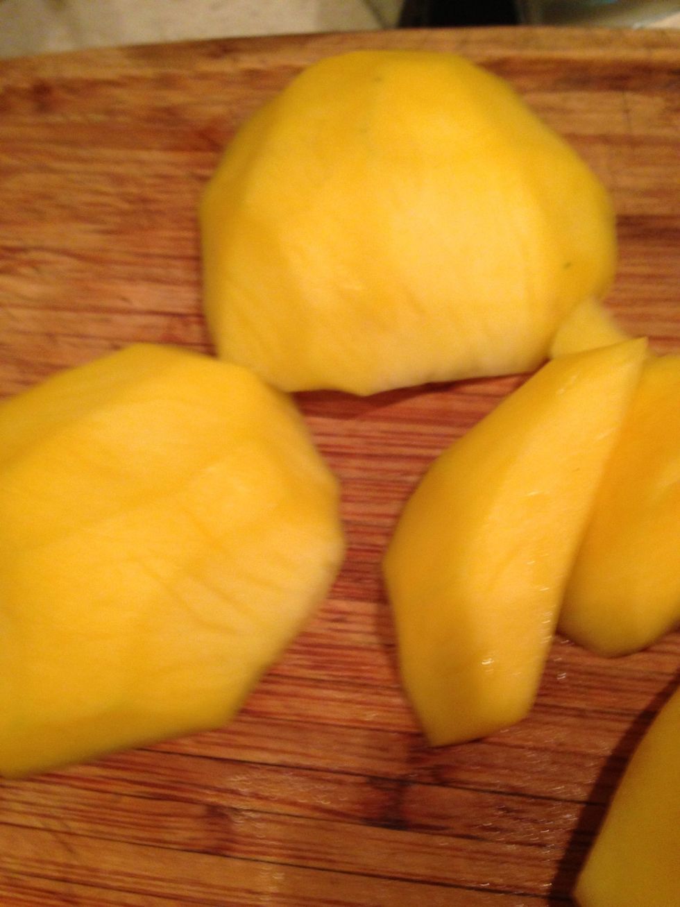 Slice the mango around the pit and discard the pit.