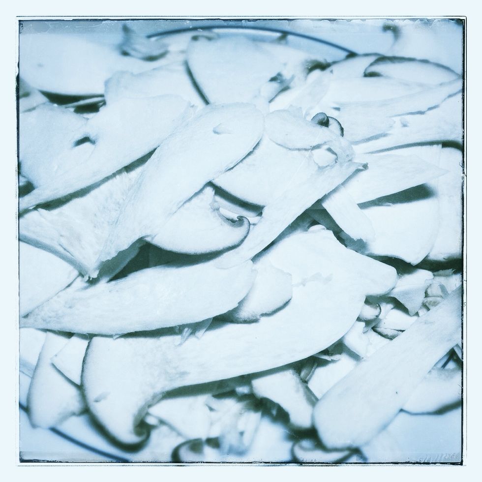 Slice the mushrooms lengthwise about 1/8" thick.