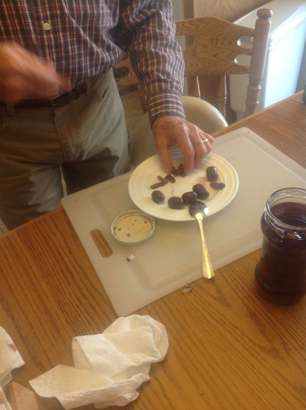 Slice the olives and remove core of olive