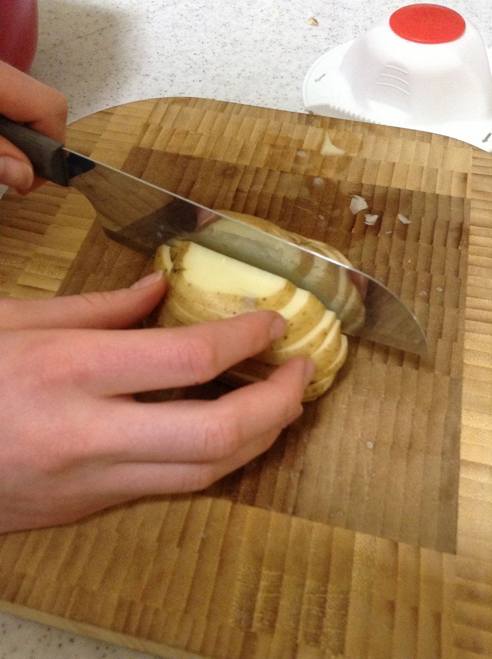 Slice the potatoes in half
