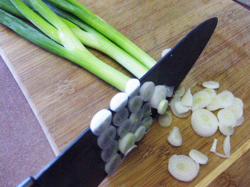 Slice the scallions using all parts but the very tip- don't forget to wash the veggies! Set the scallions aside for the top of the soup