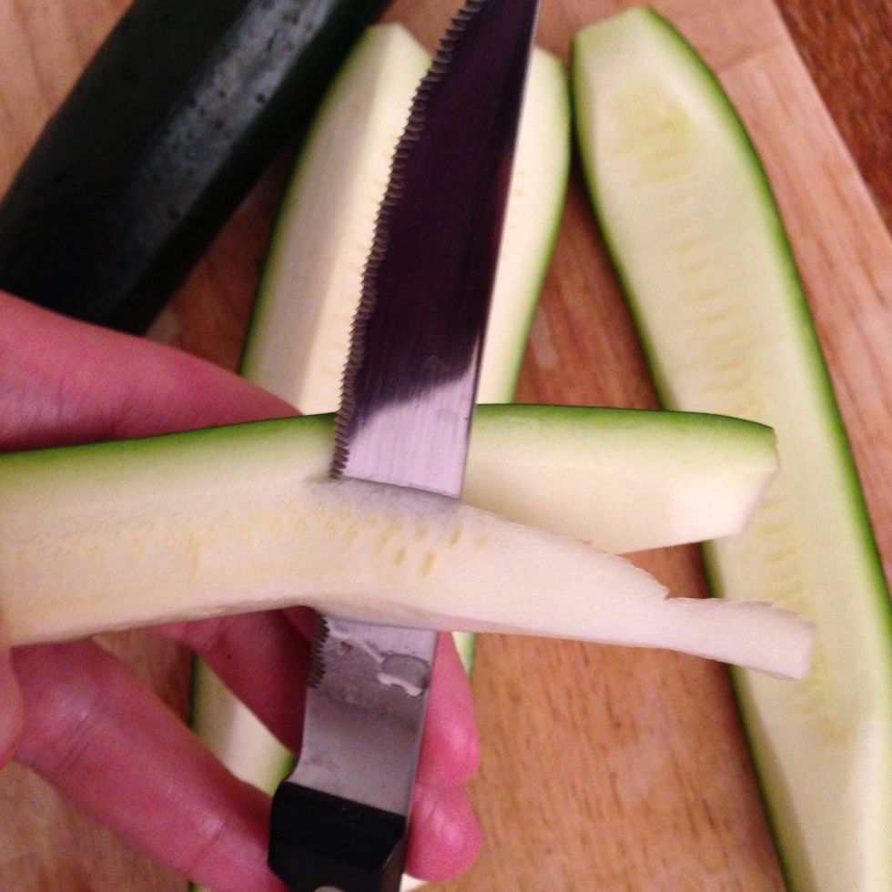 Slice the soft heart off with a small knife and set aside