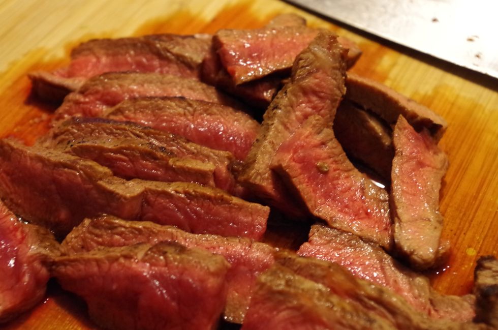 Slice the steak thinly on a bias.