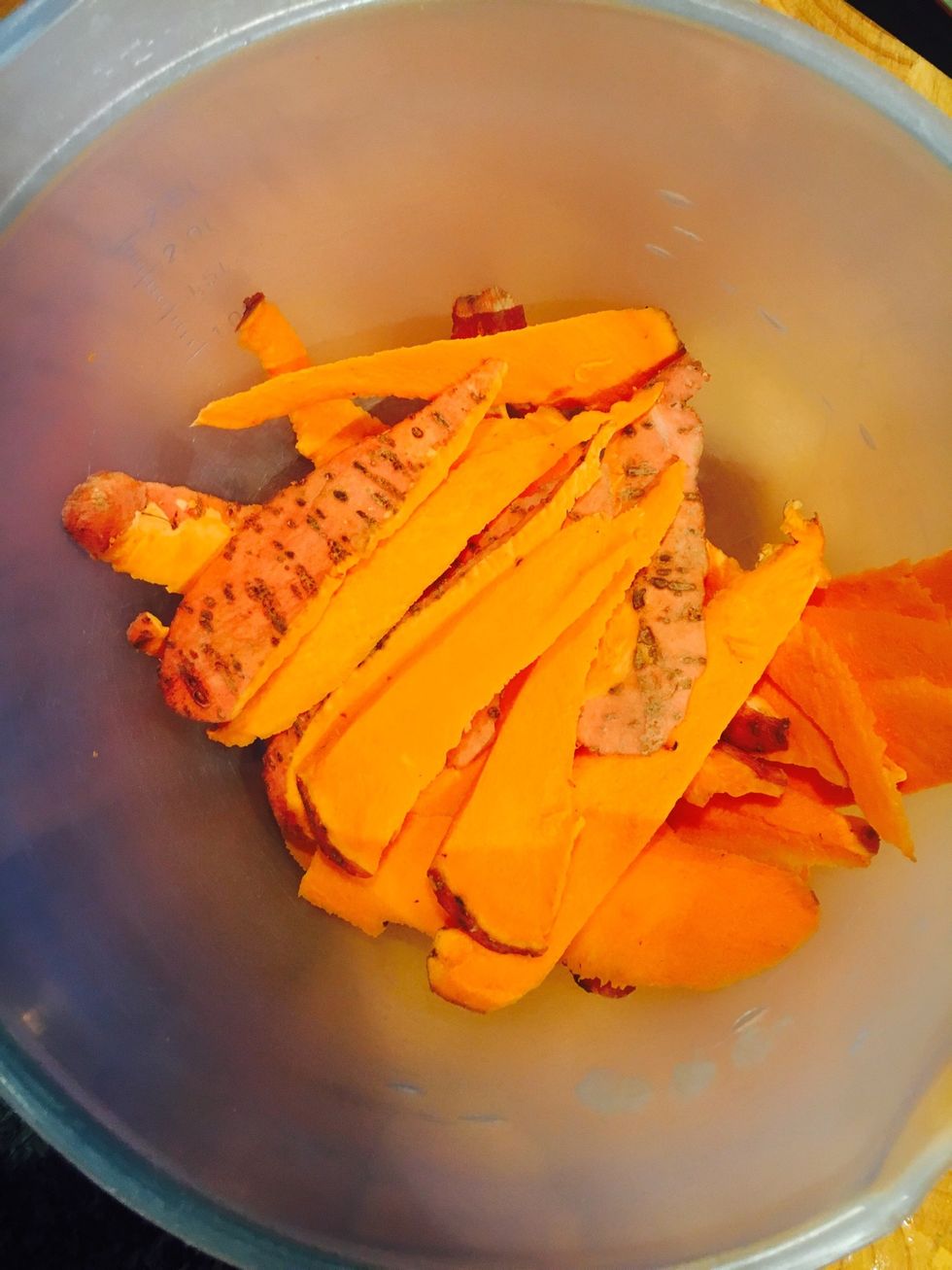Slice the sweet potato with the mandoline (cut in half first to make it easier). Add olive oil and salt. Toss or use your hands/a spoon to coat the potato sticks evenly.