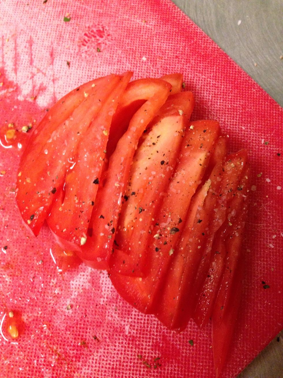 Slice the tomatoes, season if you'd like with a little salt and pepper. I am a firm believer of seasoning throughout each step!
