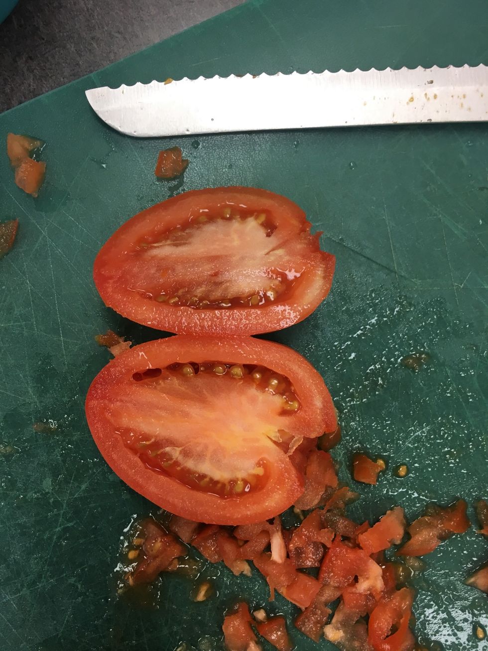 Slice the tomatoes