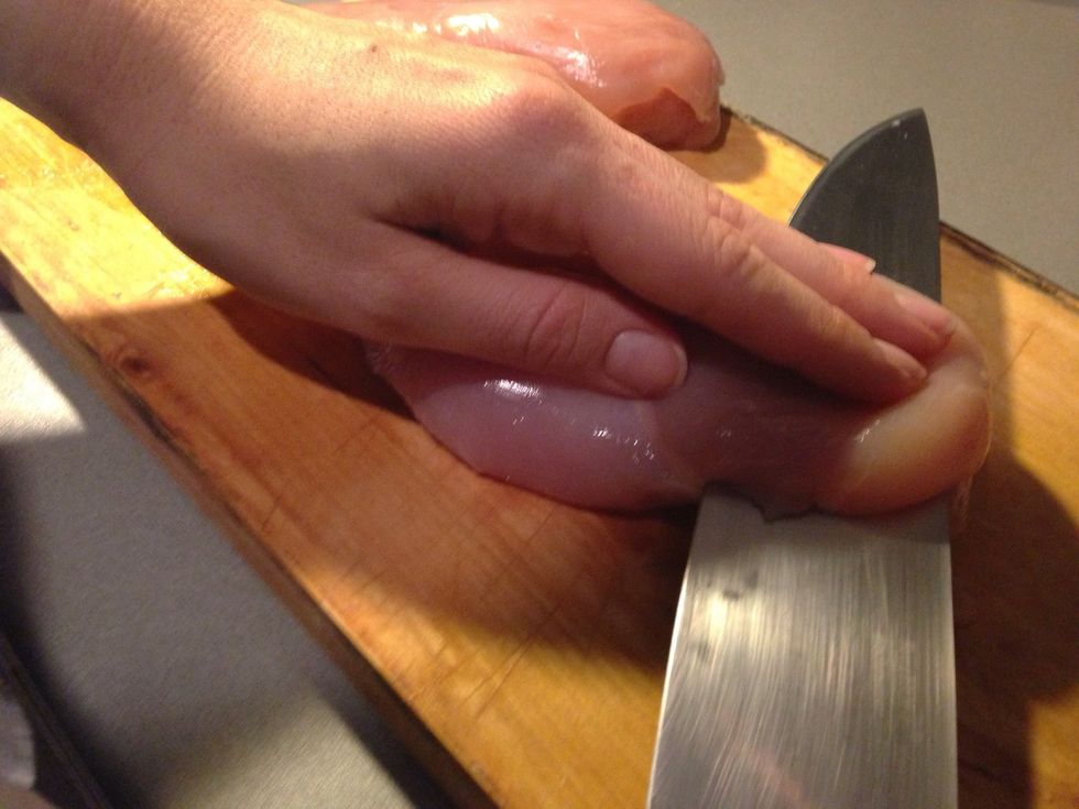 Slice through the chicken breasts