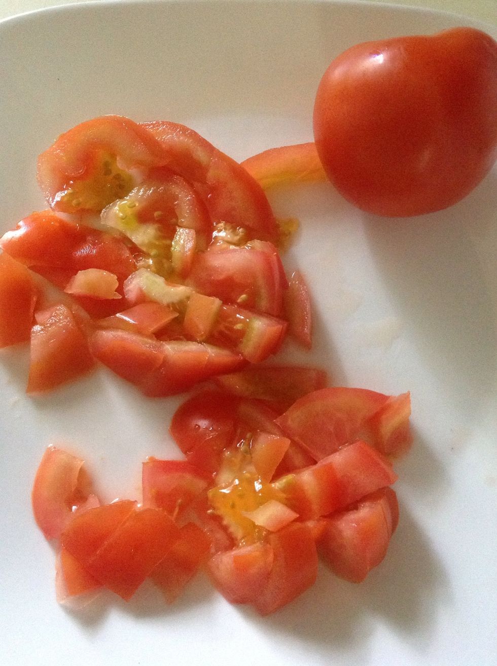 Slice tomato to taste