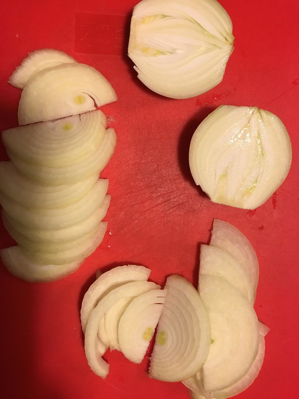 Slice two yellow onions.