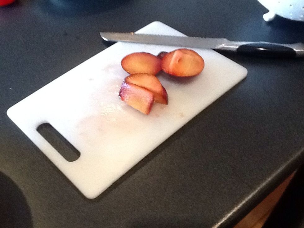 Slice up all the plums and leave the skin on