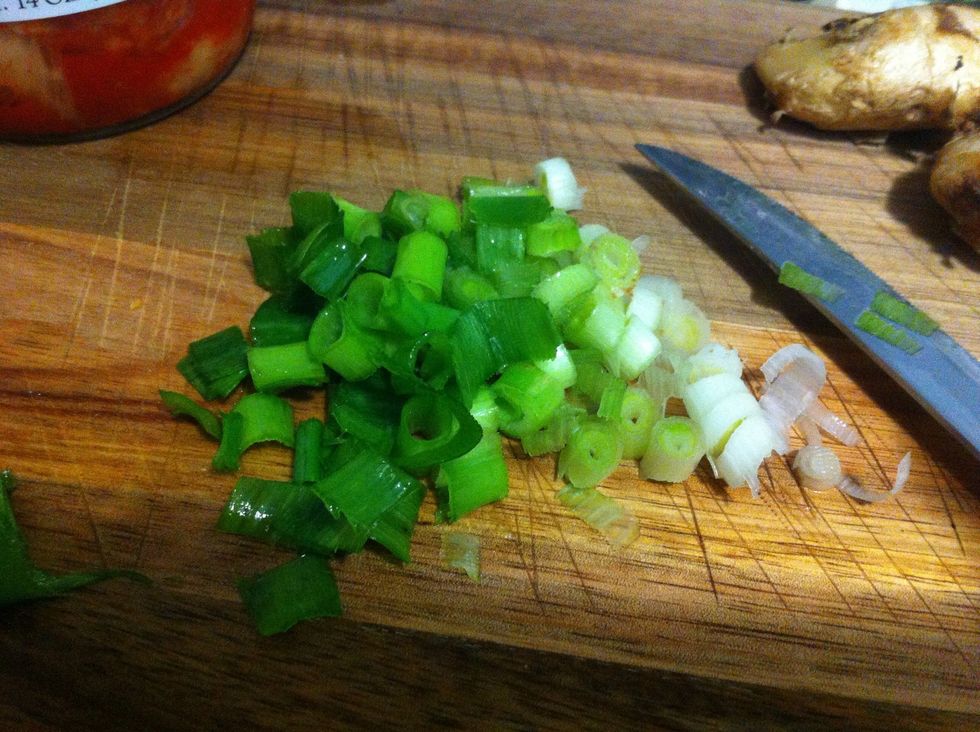 Slice up chives removing part of the white end and discarding; this will be used for both the marinade and with the bok choy (I used another 3 for the marinade)