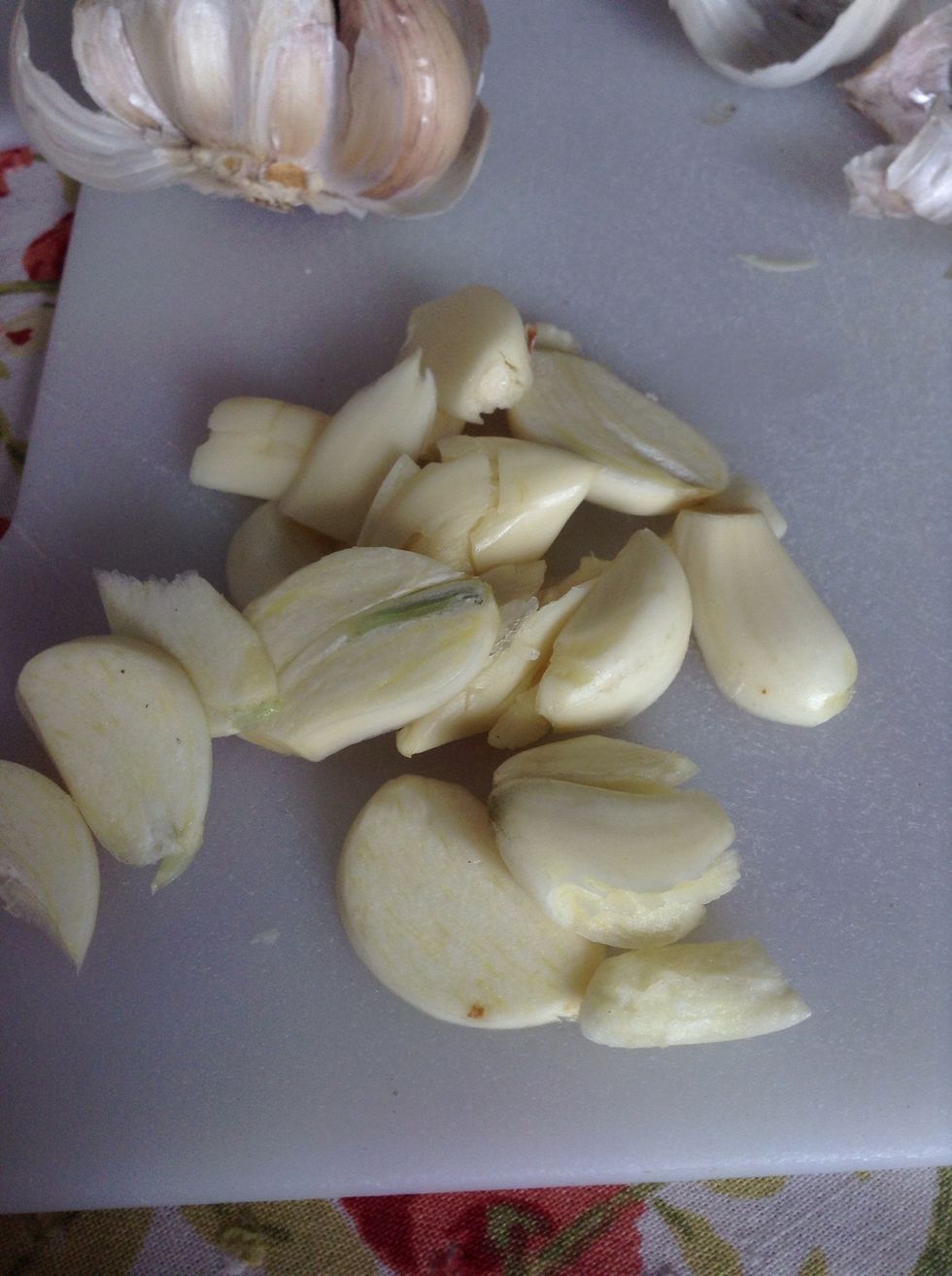 Slice up several clothes of garlic.